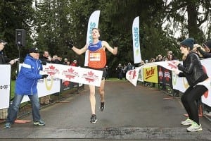 Wiebe crossing one of many finish lines /Canada Running Series