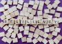 Scrabble letters spread out to form the word “resiliency”